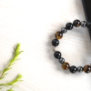 Product: Black obsidian, tiger eye and hematite bracelet for cleansing, clarity, strong mind, grounding and better health