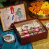 Product: Nutty Yogi Tasty Nuts Gift Box with Wooden Candle Stand